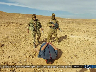 Pictures: Elimination of a spy in Anbar province Iraq by Islamic State