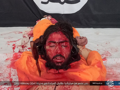 Photo Report: ISKP Capture A Taliban Militia And Behead Him