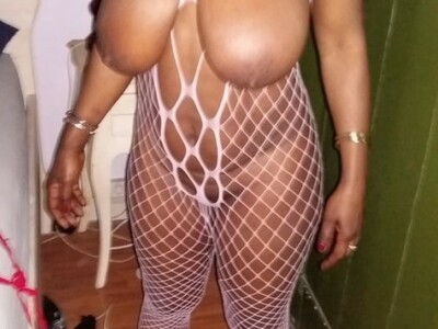 Big Tits Ebony MILF Ndey Posing in Fishnets and Nude