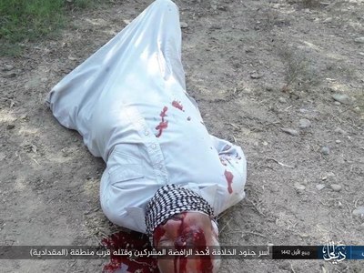 Caliphate soldiers captured and killed a Rafidah