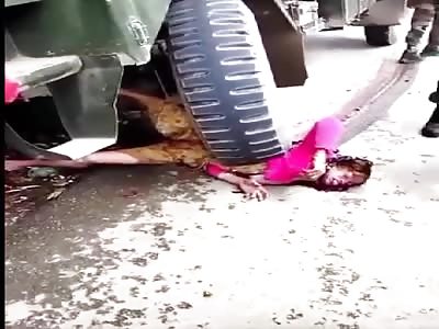 WOMAN CRUSHED BY ARMY TRUCK