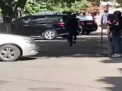 Cop takes down thief with a kick to the face.