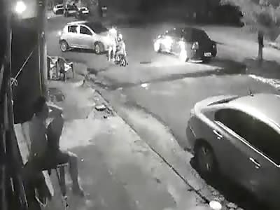 Brazilian driver reverses over man and his son