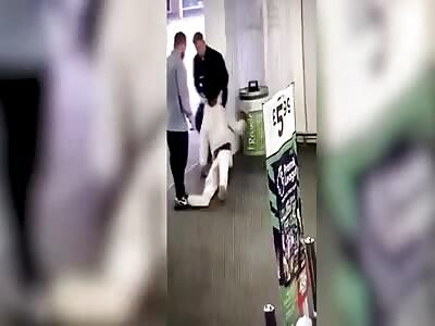 Moment a man is knocked out by a single punch inside Asda store