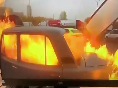 Drunk Russians almost burned in the car while smoking