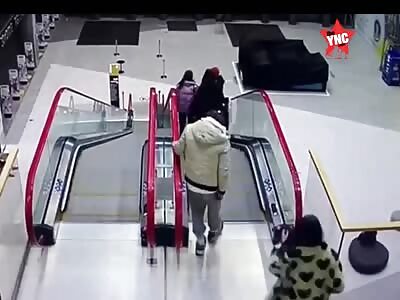 In Moscow, a girl falls off an escalator