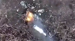 Ukrainian drone drops grenades on Russian positions