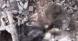 Grenade is dropped on a Russian soldier hiding in rubble