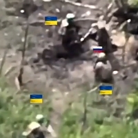 Ukrainian tank and troops work on Russian positions in Bakhmut