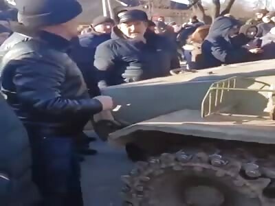 Ukrainian Civilians Facing Russians