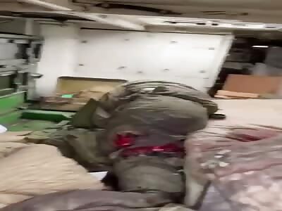 Dead Soldier Inside Russian BTR
