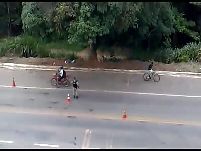The man throws himself in front of the motorcycle