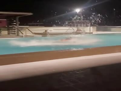 Man hits his head on the edge of the pool
