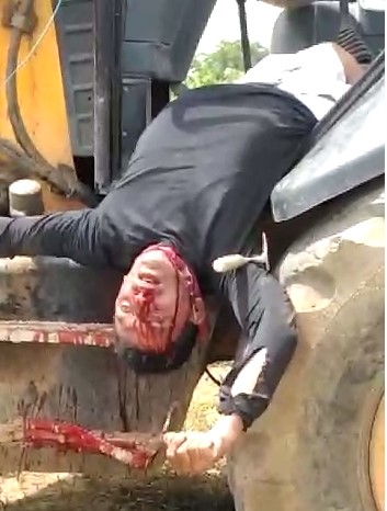 Horrible death, man shot in agony on top of a tractor
