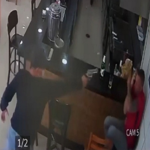 Gunman Opens Fire on Cafe Visitor