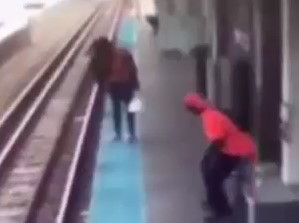 Woman Retrieves Phone on Transit Line, Exchanges Life