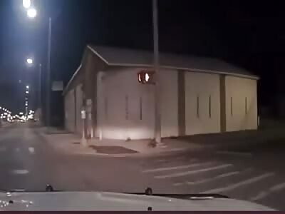 Dashcam footage of suspect shooting at police during pursuit