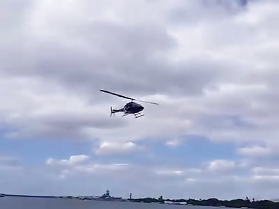 Helicopter falls in water