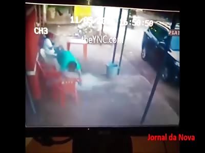 Drive By Machinegun Execution of Two Men Sitting in Front of a Bar