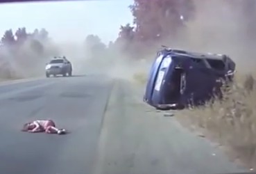 Caught on Dash Camera: Little Girl Being Ejected During Roll Over