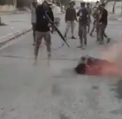 Daesh Teenager Member is Dragged, Beaten and Executed in the Street (Full Version Showing the Execution)