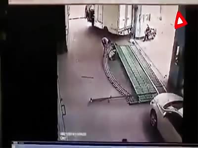 Factory Gate Crushes Man !