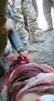 Soldier is Filmed taking the Head off of an ISIS Member 