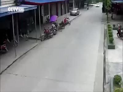 Little Boy is Struck by Car in the Street 