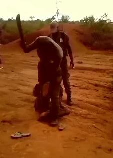 Screaming and Scared Mining Workers are Tortured with Machete by Private Security 