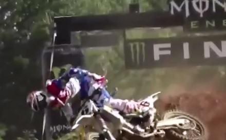 Motocross winner is knocked down while celebrating