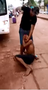 Young Boy is Held Down and Badly Beaten as Everyone Stands and Watches 