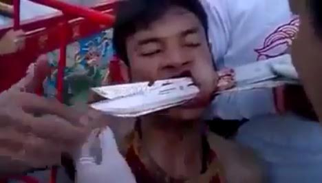 Bizarre Ritual goes Wrong as Man has Knives Shoved through his Mouth 