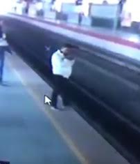 Man talking in cellphone decides to commit suicide by train 