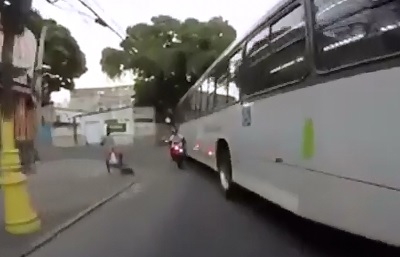 Incredible Accident..Motorcyclist is Almost Crushed by Bus 