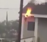 Man sets Himself on Fire and Rolls off of his Roof