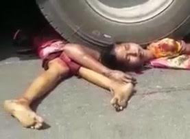 Poor Girl in Pieces under truck's Wheels