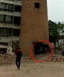 Get Out!! Workers being crushed by falling tower