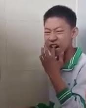 Chinese boy forced to lick his fingers with shit