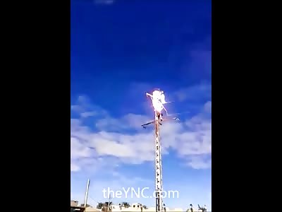 Crazy Man Commits Suicide by Electrocution on Live Wired Pole 