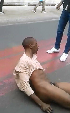 Naked Man gets a Long Barbaric Old School Style Ass Whoopin in the Streets 