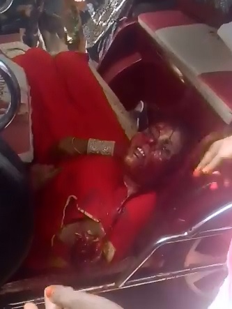 Brutal Gore:  Headless Woman in Red Dress..Onlooker Picks up her Head and Puts it Back 