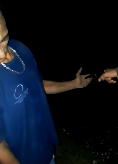 In Brazil....Thief Shot through the Hand for being Caught Stealing 
