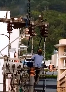 Smoldering Man on Fire being Electrocuted to Death tries in Vain to Move off Power Lines 