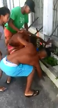 Female gets in on Gang Hazing Initiation Beating on Kid 