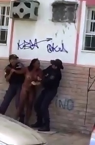 Naked Brazilian Woman Rushed by Police 
