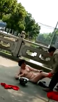 This is Crazy...Husband Violently Strips his Wife Naked and Forces Her to Parade Down the Street