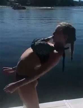 Bikini Girl Downs a Beer with No Hands