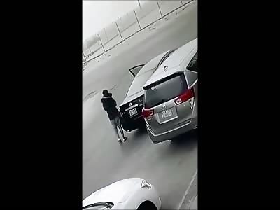 Karma:  Man trying to Burn his Gf's Car gets it Quick 