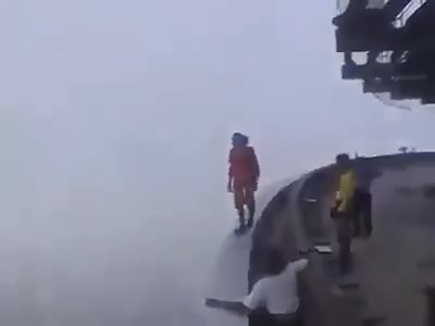  Man slides from old tower