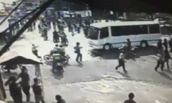 CCTV Footage of the Protester Running over Two Cops 